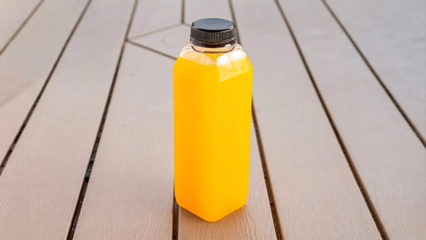 Bottle of orange mangonade